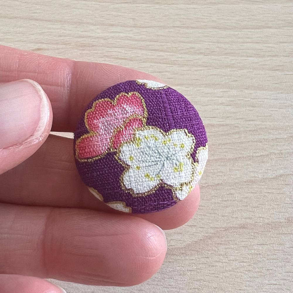 Button sakura paars roze